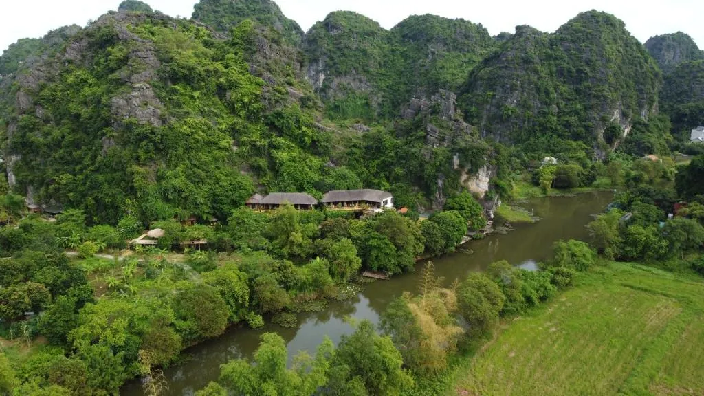 Hotel is covered in lush green forest in Trang An, Ninh Binh
