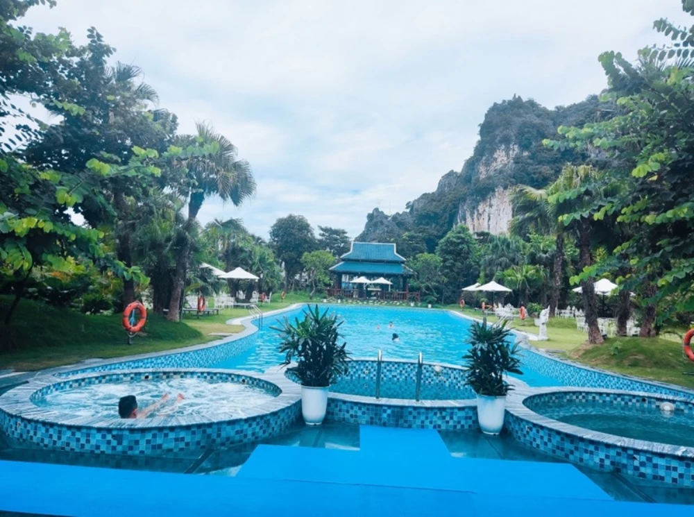 The swimming pool with hot water stream from Kenh Ga Mountain