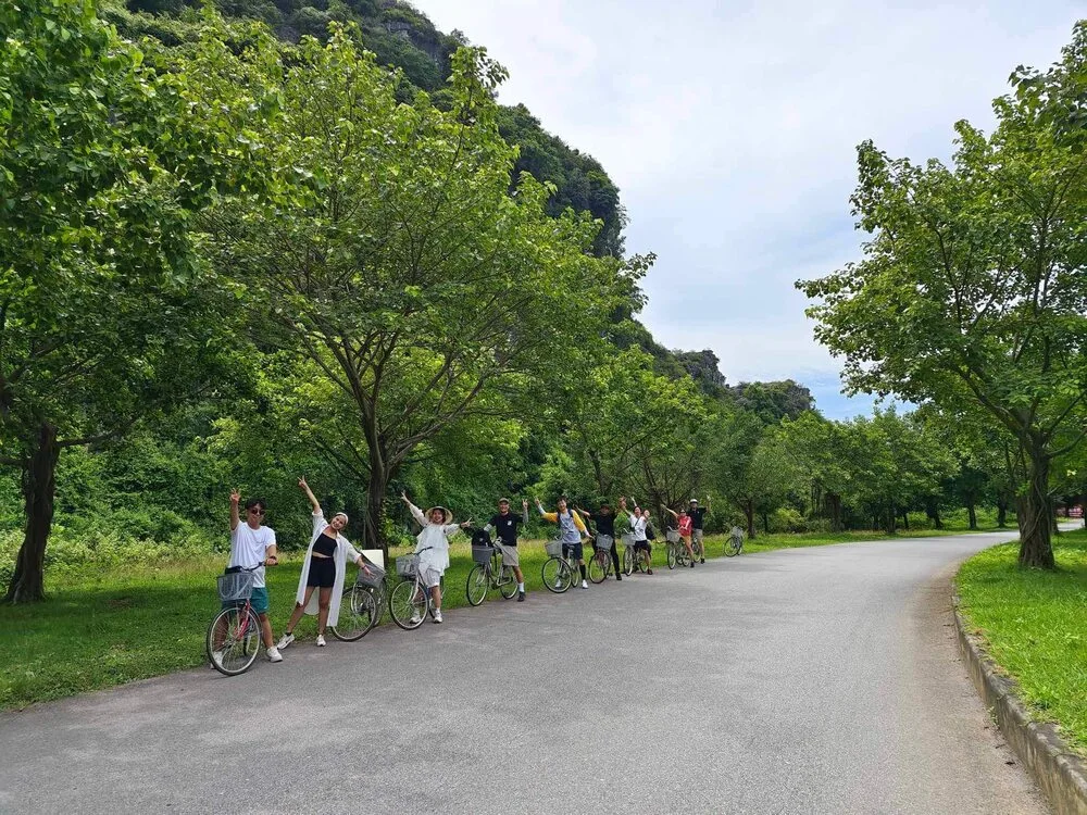 Tourists biking in Ninh Binh countryside