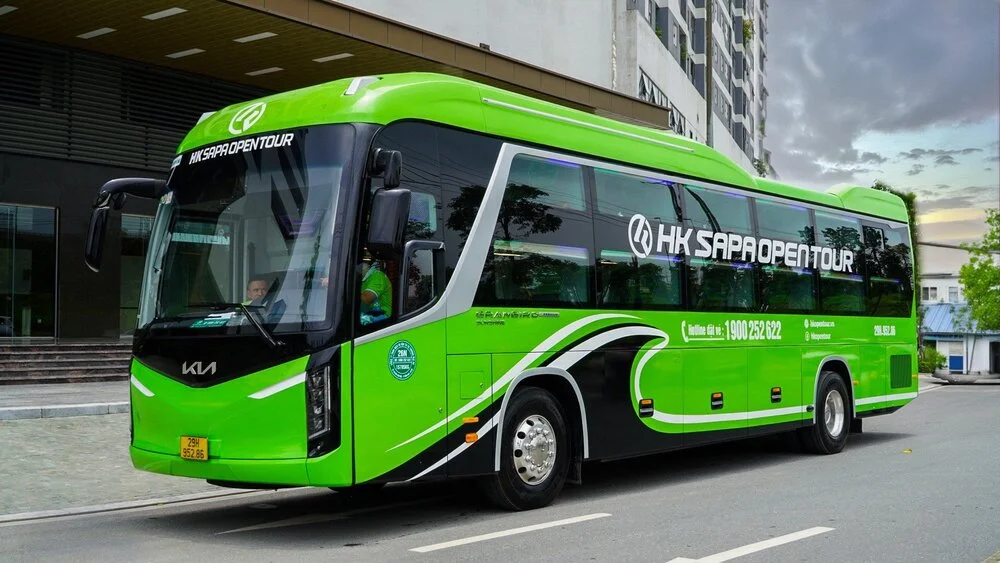 Green sleeper bus used for travel from Sapa to Ninh Binh